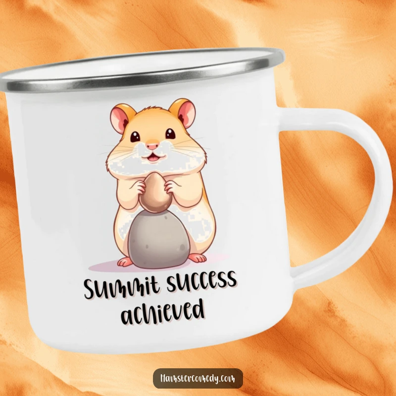 Funny hamster pebble balance camping mug, showing a tiny pet balancing a shiny pebble. Durable funny gift.
