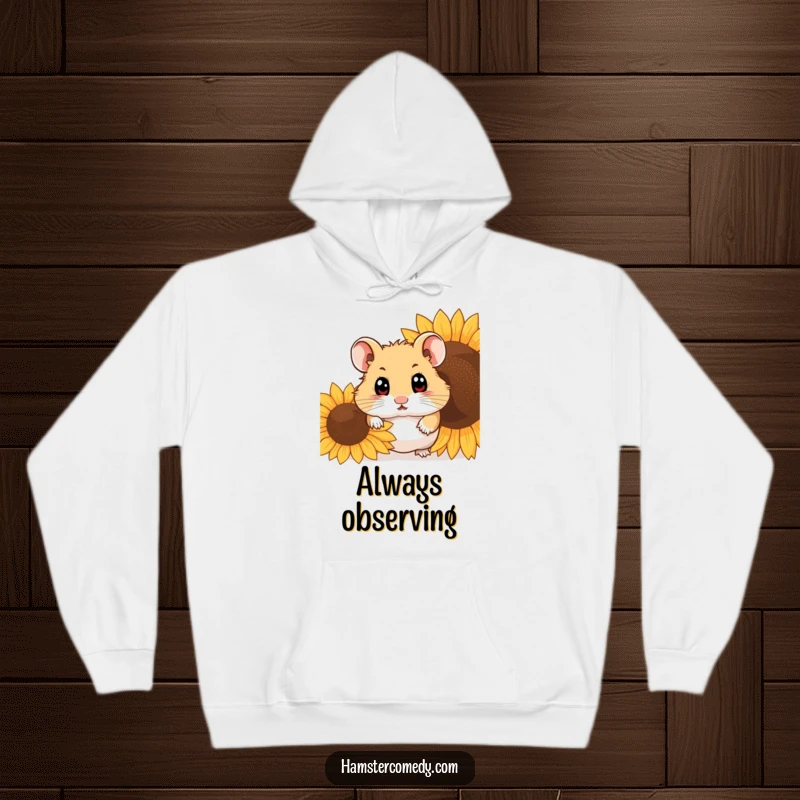 Funny hamster peeking from behind a sunflower seed on a cozy hoodie, perfect for gifts.