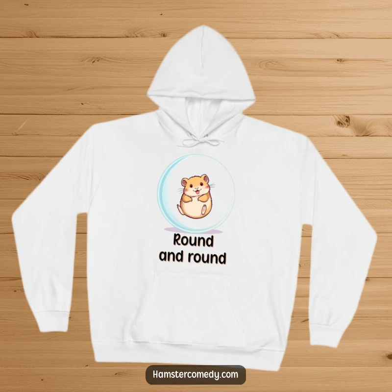 Funny hamster rolling inside a clear ball on a cozy hoodie, perfect for gifts.