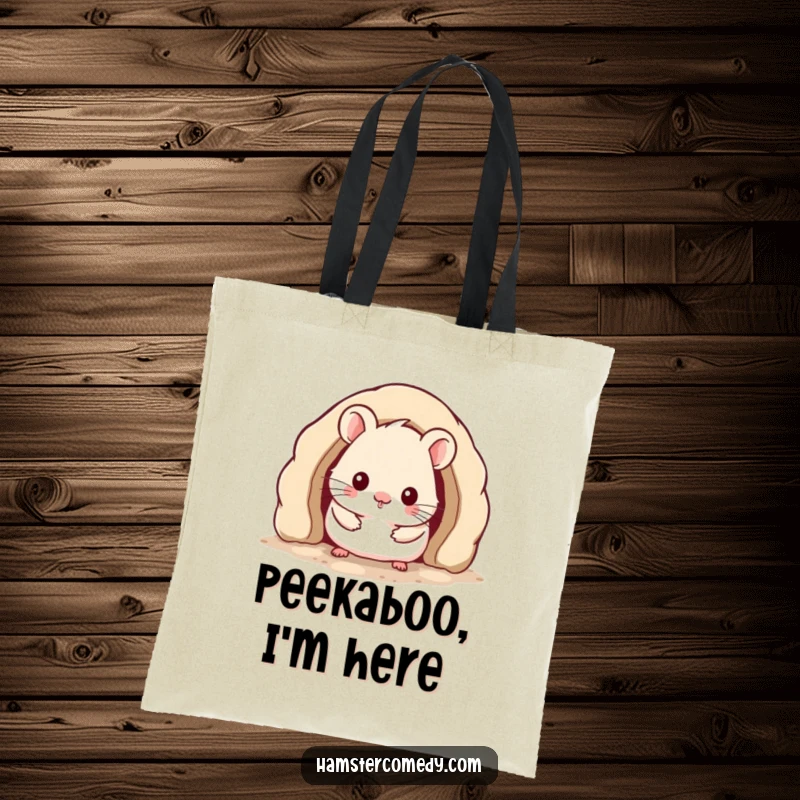Funny Kawaii Hamster Tote Bag featuring a cute hamster peeking from a cozy burrow, a stylish and humorous accessory.