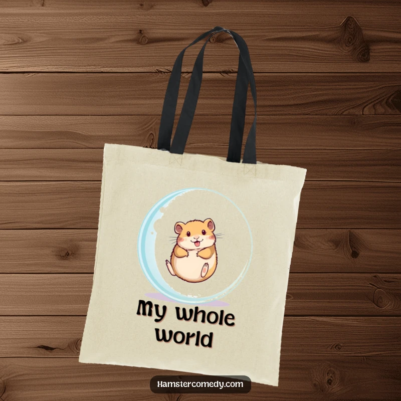 Funny hamster rolling inside a transparent exercise ball on a durable tote bag, ready for gifting.