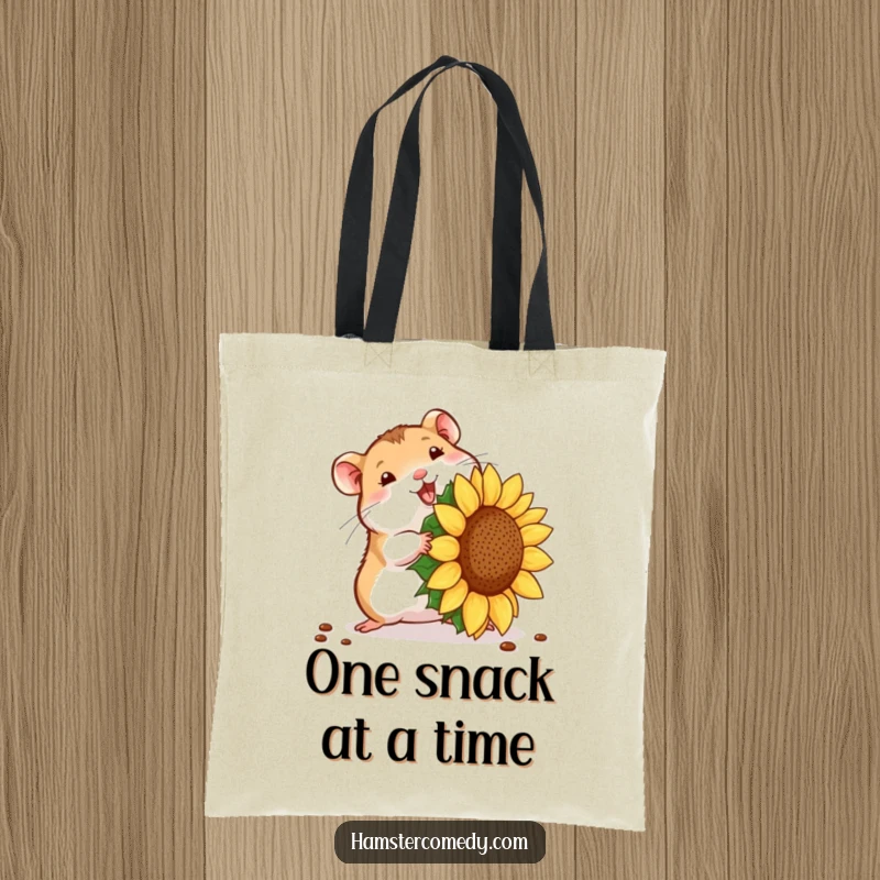 Funny hamster seed struggle tote bag, featuring a small hamster with a giant sunflower seed. Practical funny gift.